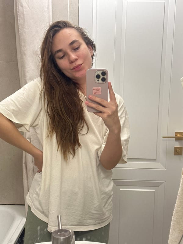 Woman takes bathroom selfies in Kharnavy, Russia