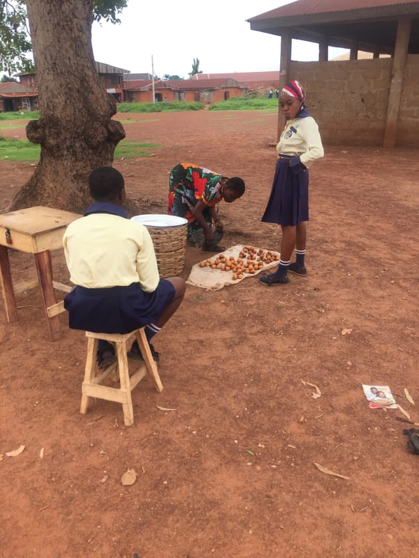 Student in uniform spotted on soil in Enyibichiri, Nigeria