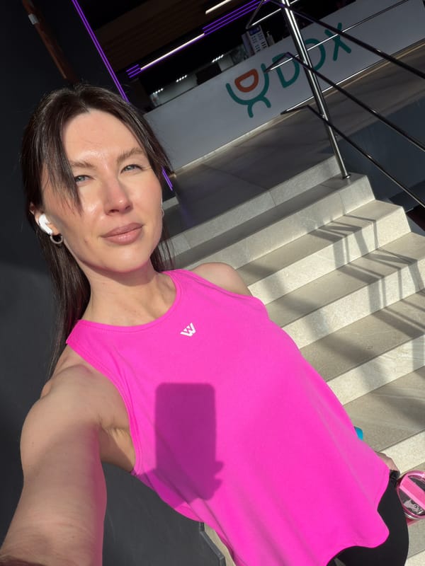 Woman takes selfie in pink top in Perm, Russia