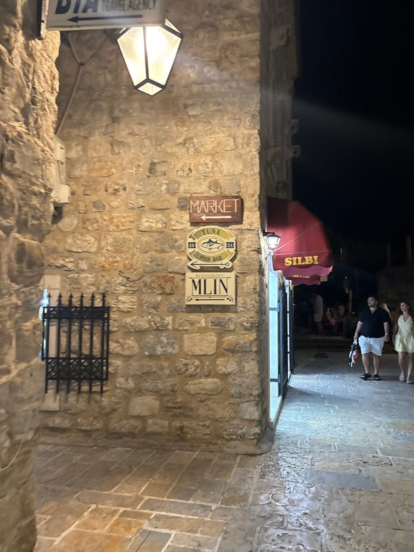 Evening stroll through historic Budva old town captured