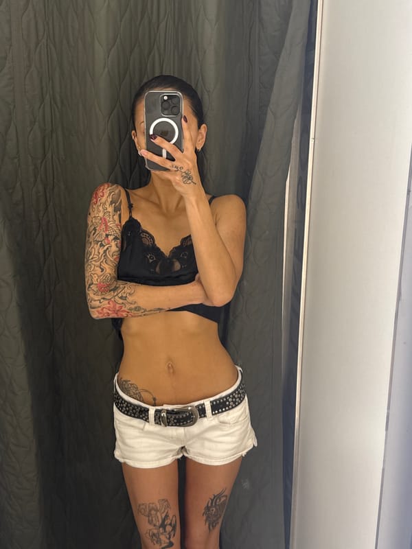 Quick selfie session across a London changing room and couch