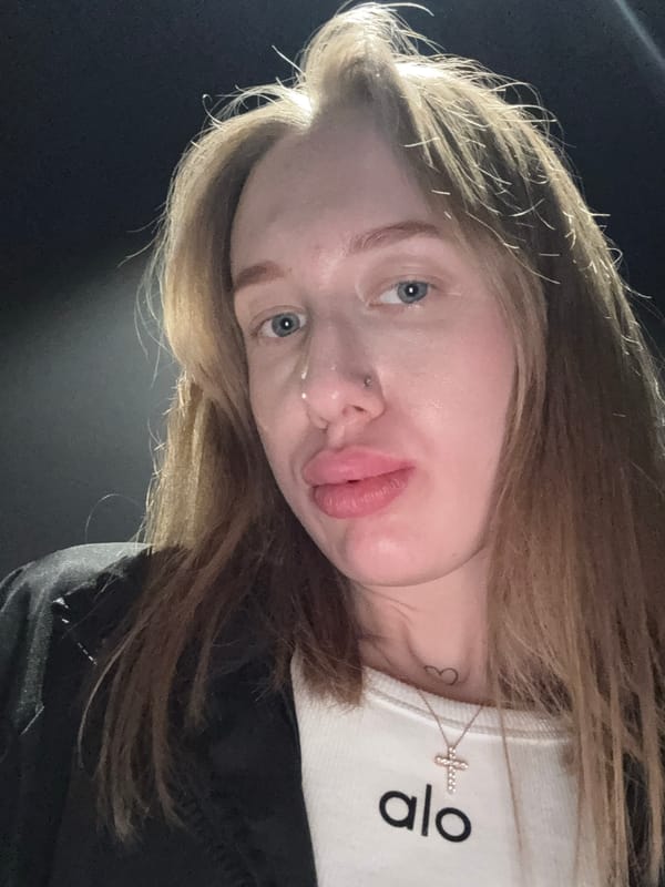 Person takes selfie with pouting expression in Russia
