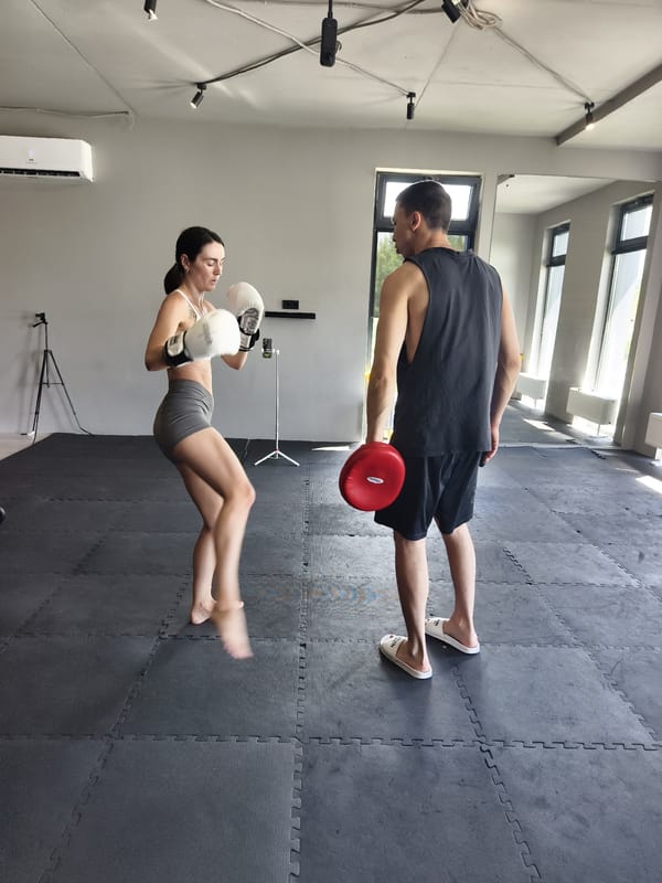 Boxing pad drills at a Tyumen gym