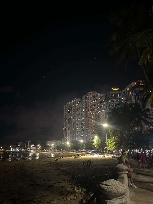 Group performs line dance on Nha Trang coastal sidewalk
