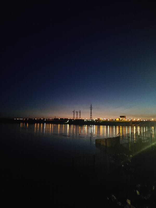 Evening waterfront scenes documented in Chaikovsky, Russia