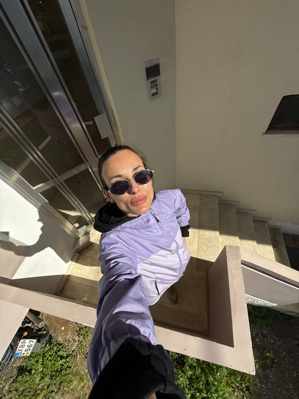 Woman in NASA hoodie photographed during afternoon in Chania