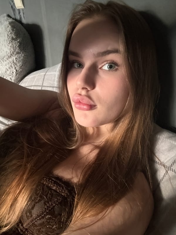 Afternoon selfie session in a Dnipro apartment bedroom