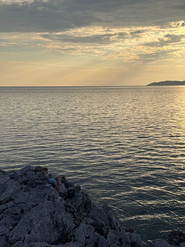 Golden hour on the cliffs above Sveti Stefan's sea