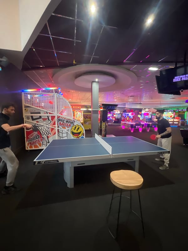 Ping pong players at Bristol arcade entertainment center