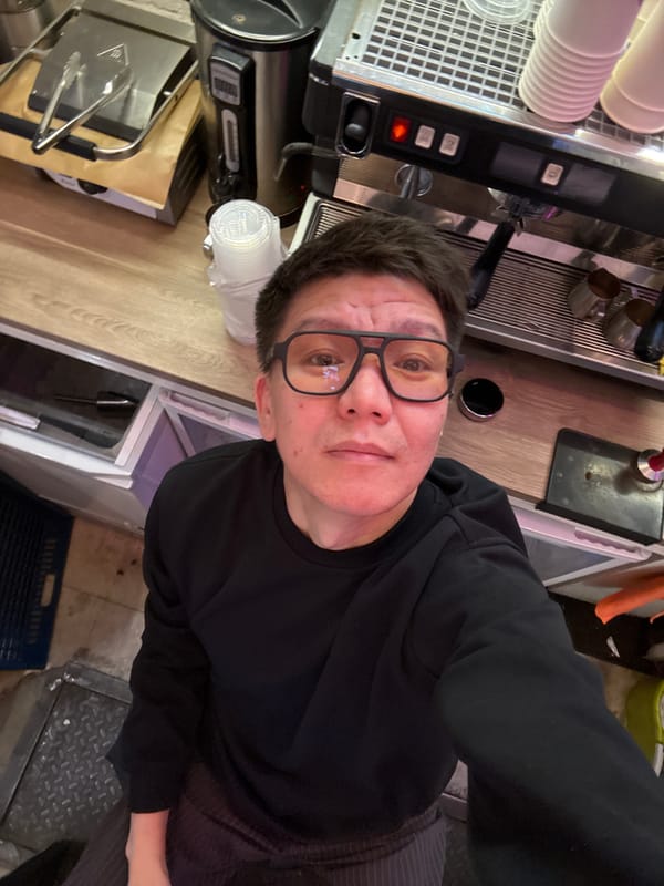 Selfie at a Moscow café with espresso bar backdrop