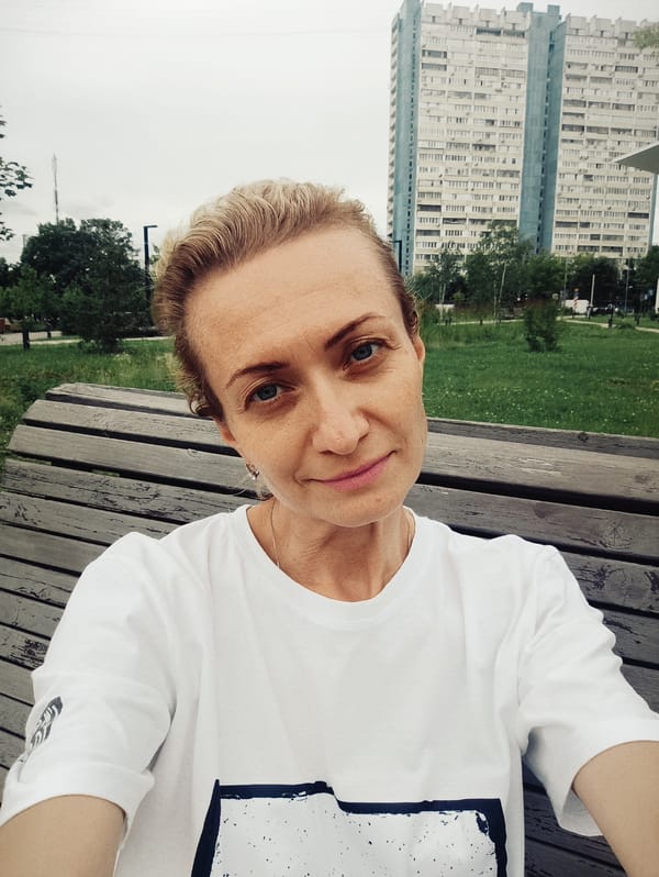 Relaxing on a Moscow park bench on a grey afternoon
