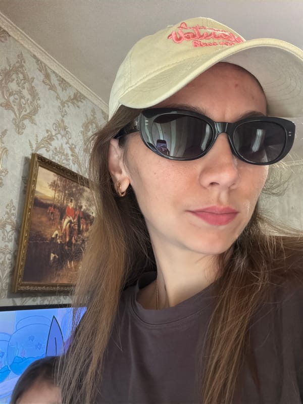 Lazy summer morning indoors in Tambov, with fresh yard trimmings outside.