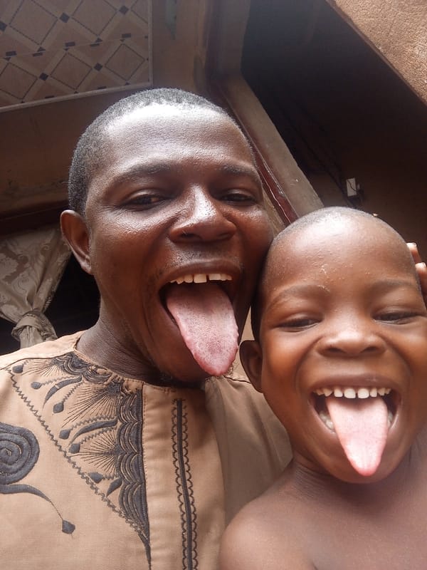 Father and child photographed together in Tempure, Nigeria