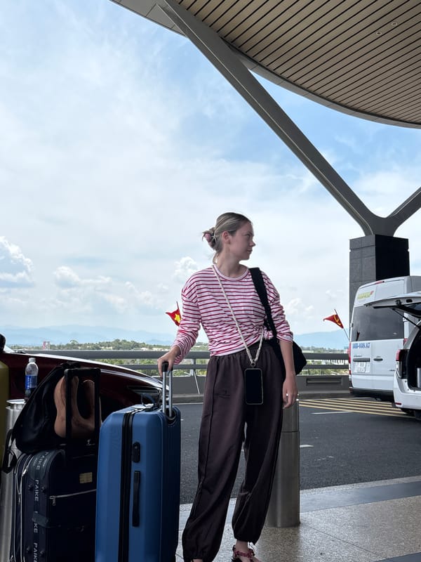 Early morning travelers gather at Cam Ranh International Airport