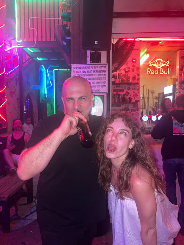 A Tel Aviv bar night, neon lights and good vibes