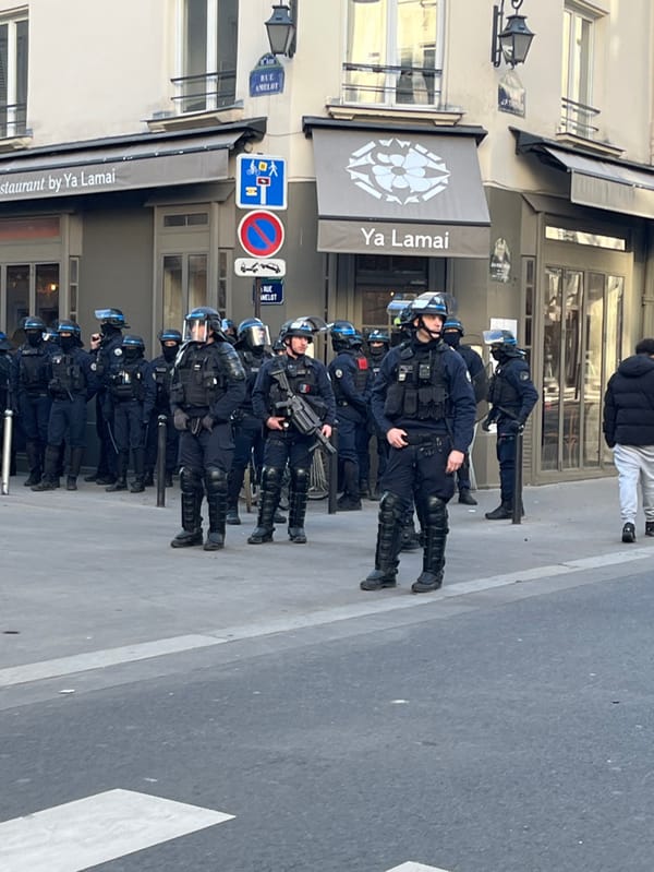 Police in riot gear deployed at Paris intersection