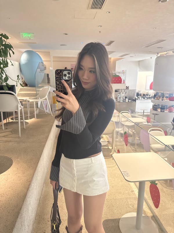 Young women take morning selfies at Jiangbei cafes