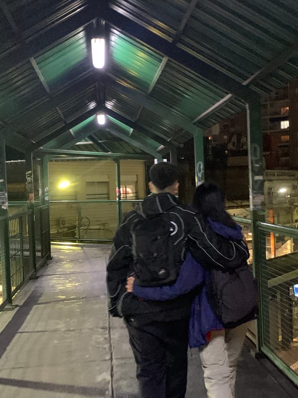 Nighttime urban scenes captured across Ramos Mejía station area