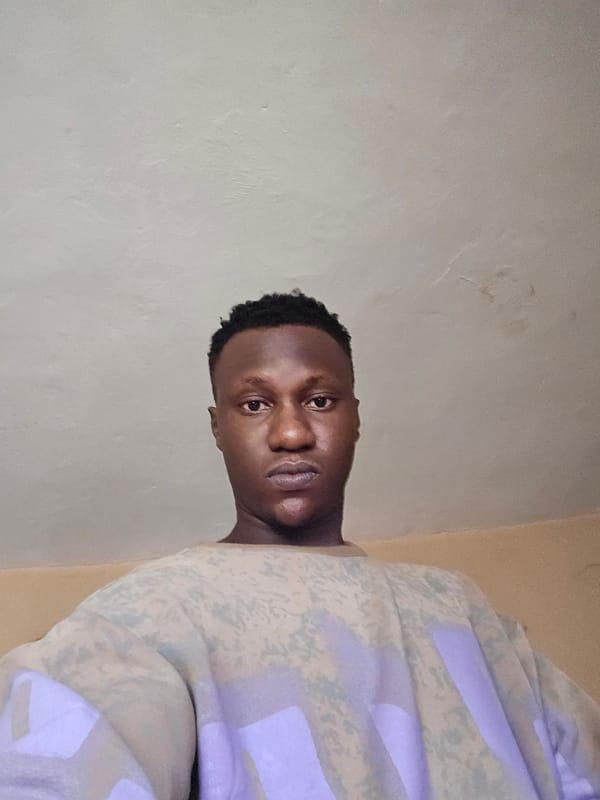 Two men photographed in Nkwelle, Nigeria