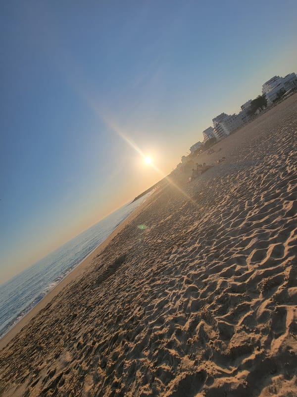 Golden hour at Quarteira beach, Algarve coast