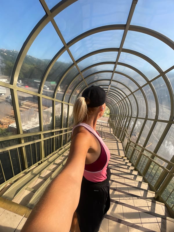 Quick stop on a glass-covered staircase bridge in Sochi