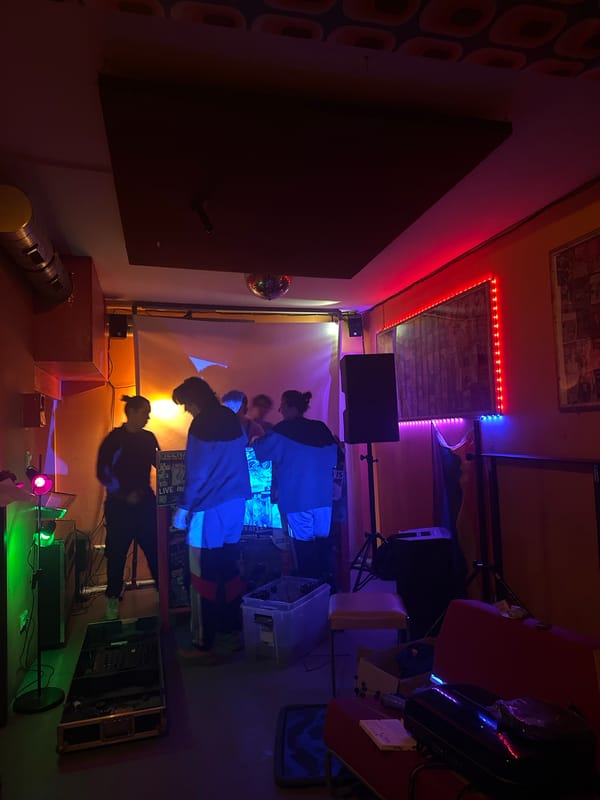 Berlin witnesses document indoor LED gathering, graffitied building exterior