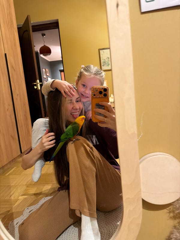 Family celebrates Easter with pet Sun Conure parrots in Khimki