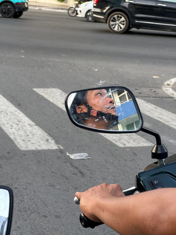 Masked motorcyclist travels through Thủ Đức streets