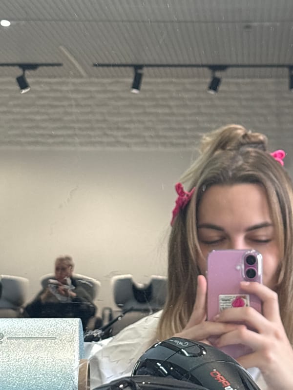 Woman takes mirror selfie in Krasnoyarsk, Russia