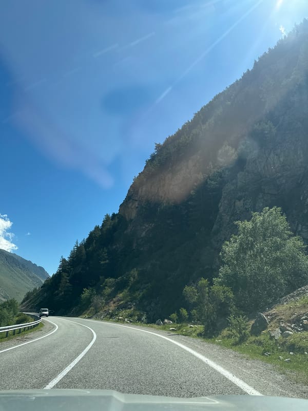 Winding through a mountain valley road in Upper Baksan