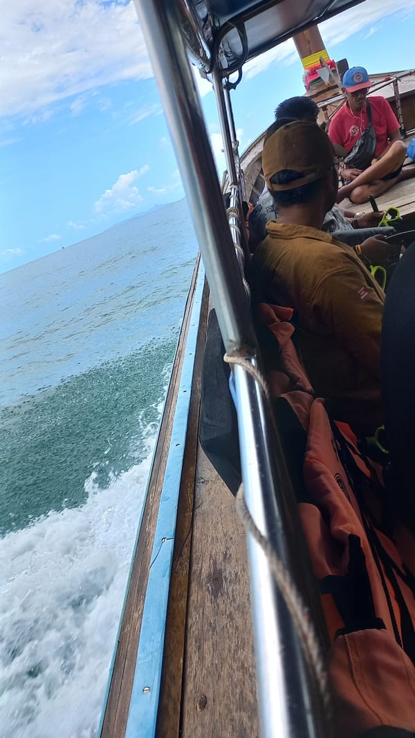 Tourists take boat excursion in Ban Ao Nang, Thailand