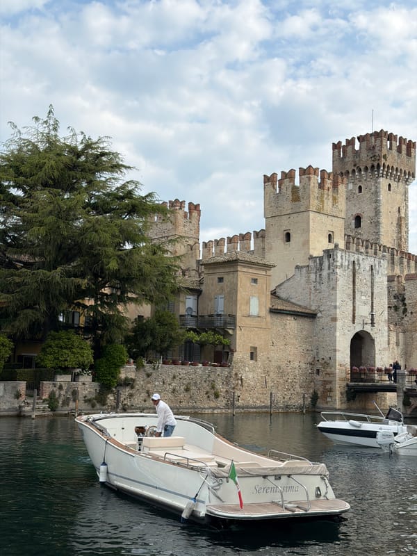 Morning scenes captured at historic Scaliger Castle waterfront, Sirmione