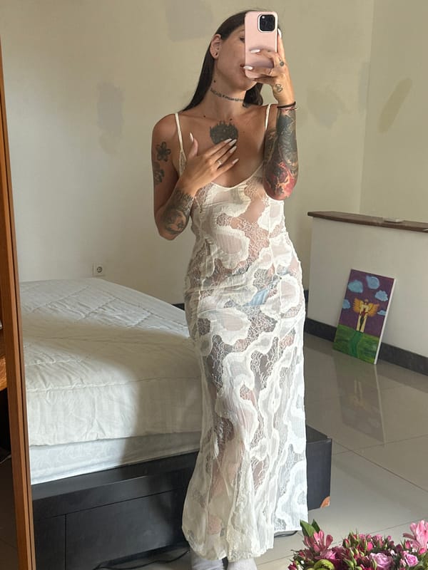 Tattoo-heavy mirror selfies from a North Kuta room, Bali