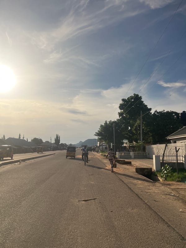 Afternoon sunlight illuminates streets and buildings in Jalingo, Nigeria