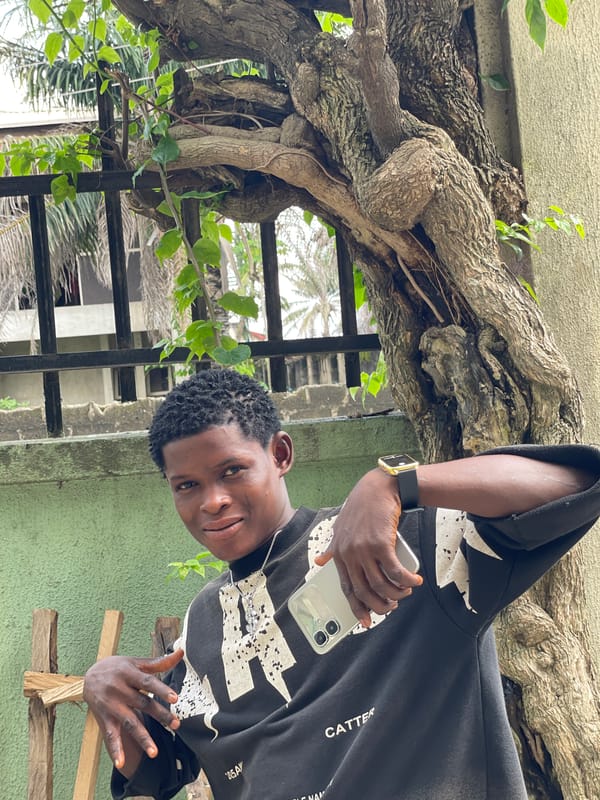 Young men photographed during casual afternoon in Ado, Nigeria