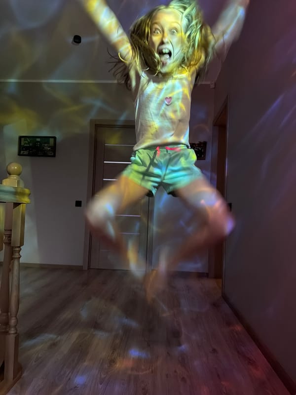 Child performs gymnastics routine indoors in Dreiliņi, Latvia