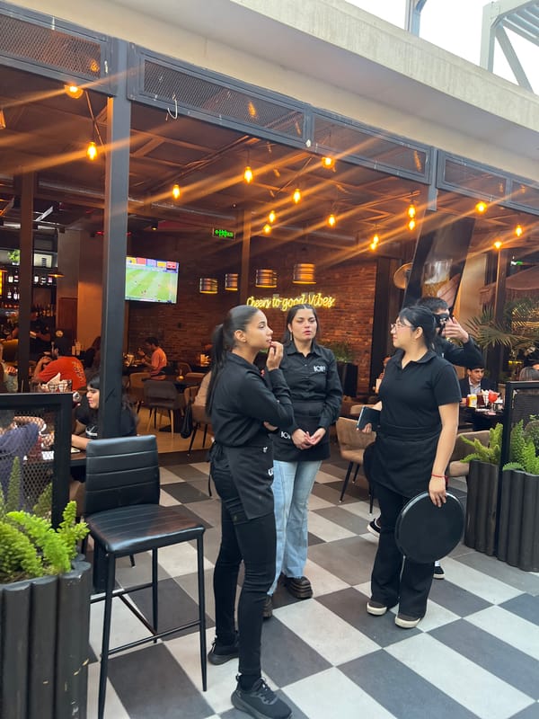Evening dining scene captured at Raw Bar restaurant in Arica
