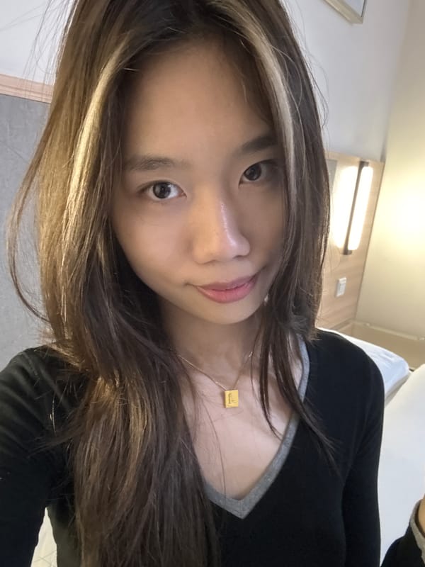 Woman takes selfies in Chongqing hotel room