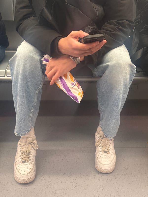 Morning commuter uses public transport with earphones in Sofia