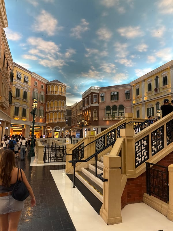 Visitors explore Venice-themed canals at Venetian Macao resort