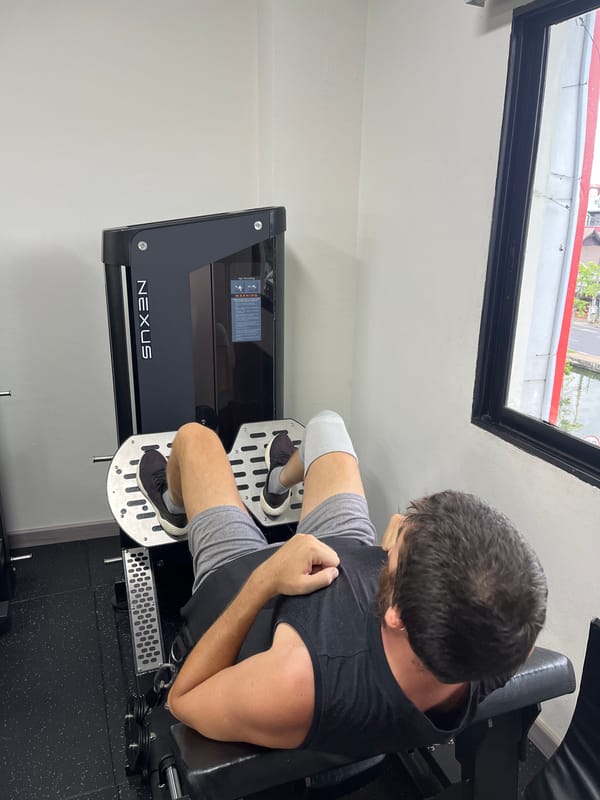 Leg day on a Nexus machine at a Chiang Mai gym