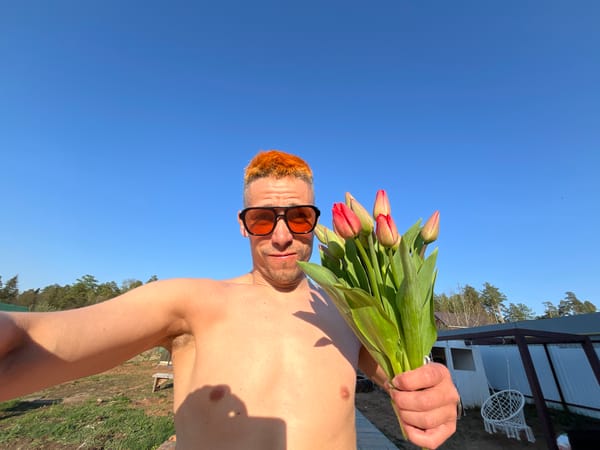 Orange-haired man spotted with tulips, drink in Chaikovsky
