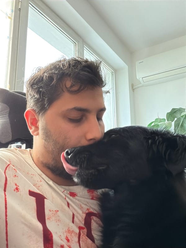Man shares affectionate moment with black dog in Sofia