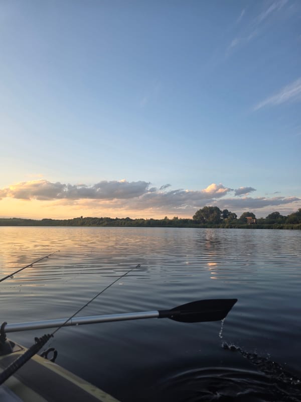 Kayaking through lily pad-covered waters at sunset, Ternopil
