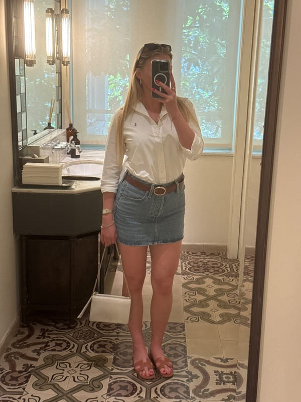 Woman Takes Selfies in Dressing Room During Morning Shopping