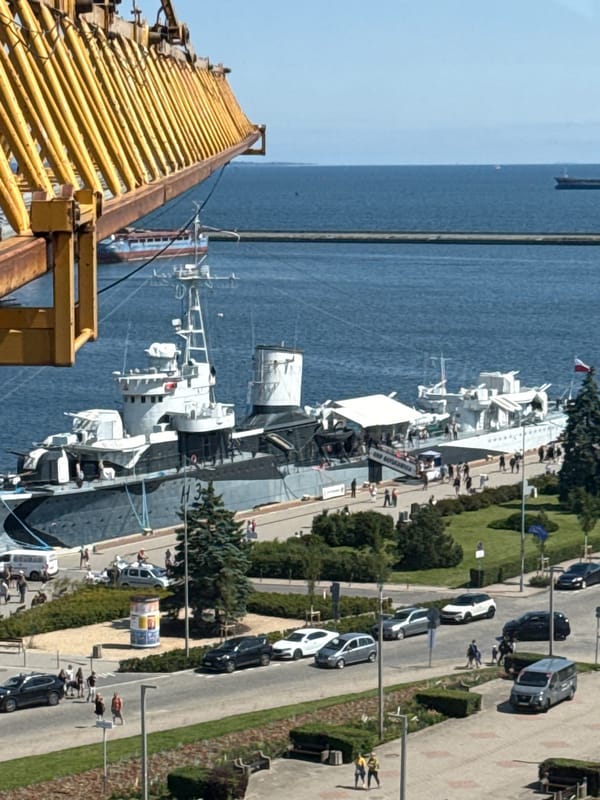 Gdynia's harbor district: warships, tall ships, and active construction