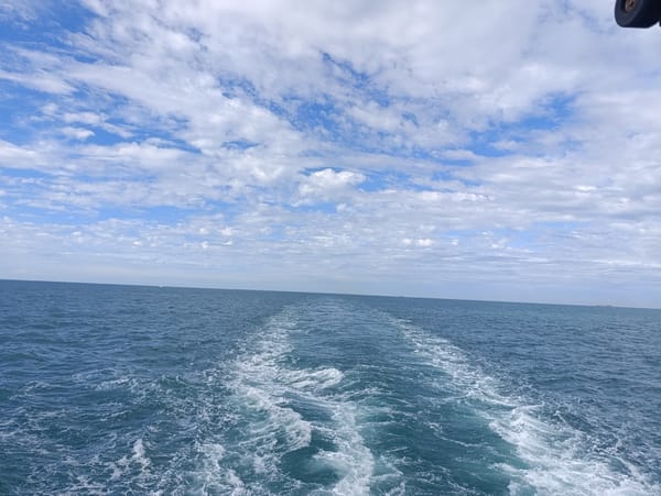 Open ocean wake view from a moving vessel's stern