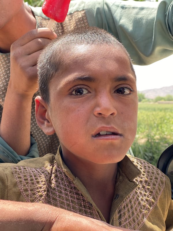 Children photographed in outdoor setting in Nowruzi, Afghanistan