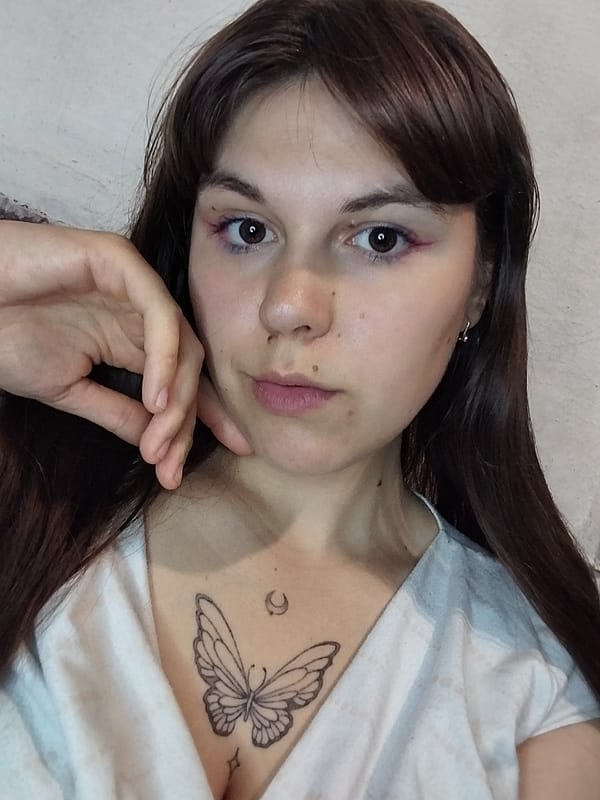 Close-up selfie series, same person, slight outfit variation