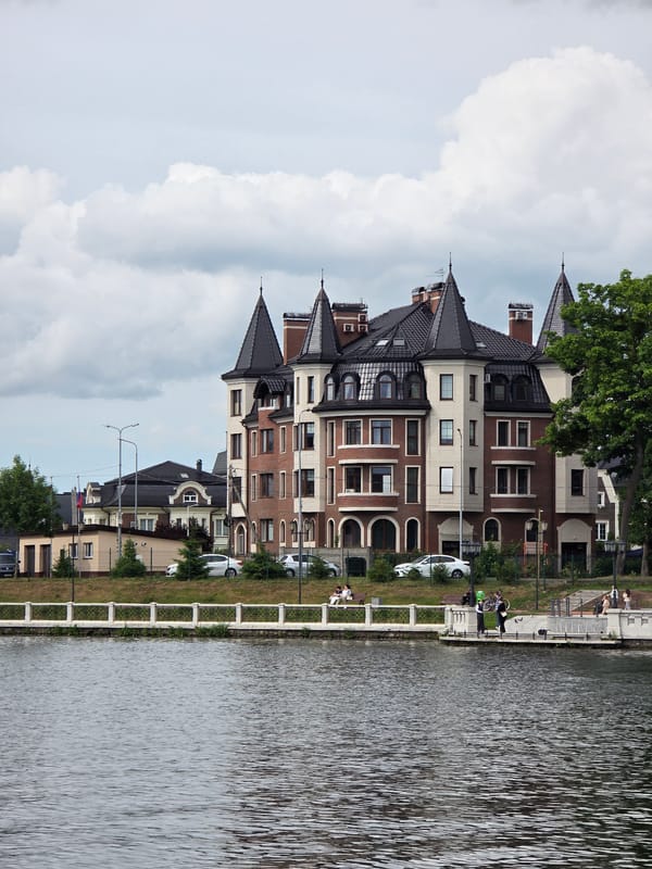 Tourist documents Kaliningrad landmarks and architecture during afternoon walkabout